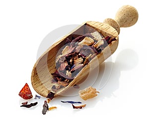 Wooden scoop with fruit tea