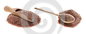 Wooden scoop and spoon with black salt on white background. Banner design