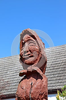 wooden sculpture - fisherman and fisherwoman in DziwnÃ³w, Poland