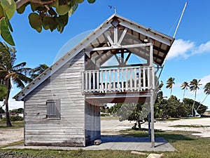 Wooden security booth on a guarded Caribbean beach. Surveillance, first aid and security post. Caribbean construction. Lifeguard