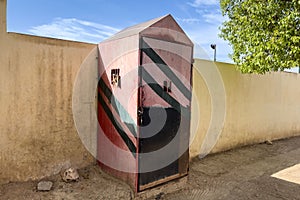 A wooden security Booth in the street