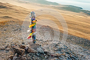 Wooden shaman totems at Burhan Cape, Baikal Lake, Russian Federation