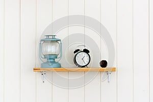 Wooden shelf with decoration objects