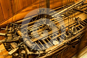 Wooden ship model close-up, mast, guns, cables