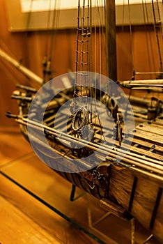 Wooden ship model close-up, mast, guns, cables