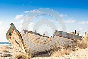 Wooden shipwreck on a beach in Malia, Crete