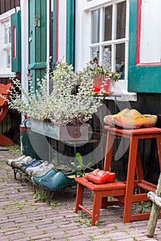Wooden shoes in front of a house in Marken