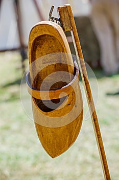 Wooden shoes hanging in rack