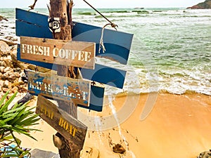 Wooden sign on the beach