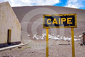 Sign marking Estacion Caipe, on the abandoned railroad in the high altitude Salta puna desert photo