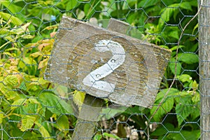 Wooden sign giving garden plot number