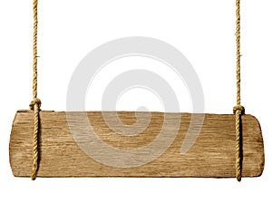 Wooden sign hanging from ropes