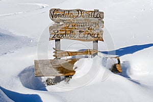 Wooden sign on mountain