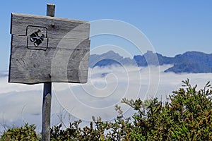 Wooden sign on a viewpoint