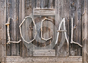 Wooden sign Wood stick type font Local Signage on wooden wall