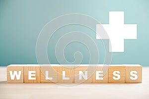 Wooden sign with the word wellness