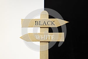 Wooden sign with the words black and white photo