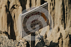 Wooden sign"El Buen Abuelo, the Nice Grandfather" in Valley of Moon (Valle de la Luna), Bolivia photo