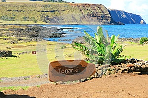 Wooden signpost at the entrance to Ahu Tongariki ceremonial platform on Easter Island, Chile