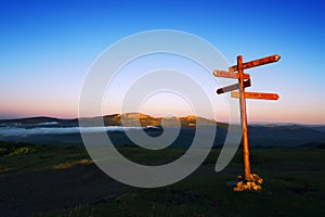 Wooden signpost on Saibi mountain