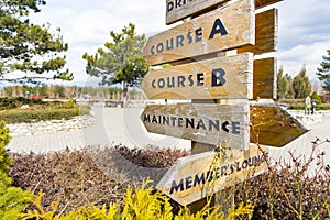Wooden signs at the golf course outdoor