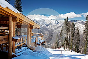 Wooden ski chalet in snow photo