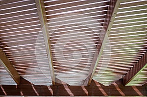 Wooden slat roof overhead walkway