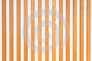 wooden slats arranged vertically on a white background. Interior design