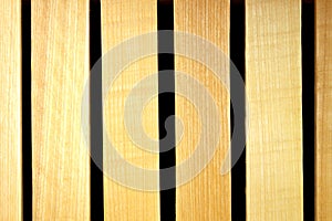 Wooden slats made of lime wood on a black background