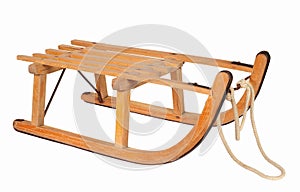 Wooden sledge isolated over white