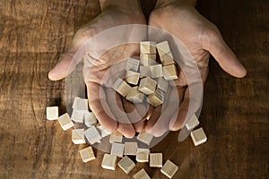 Wooden small blocks on the background. Background for desktop. Office style.Agile and scrum. Team players.Social life.In