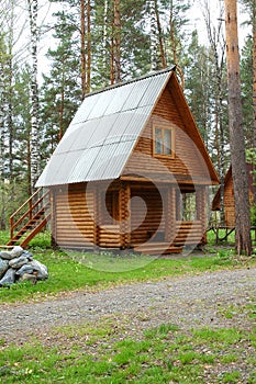 Wooden small house in a wood