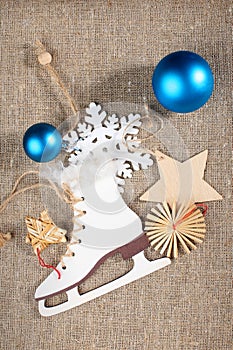 Wooden snowflakes and toy skates.