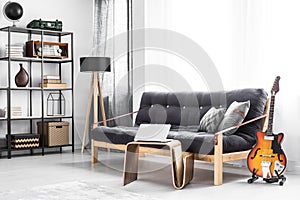 Wooden sofa with black futon