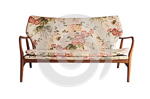 Wooden sofa upholstered in floral fabric printed, vintage style