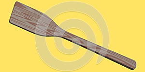 Wooden solid turner or kitchen utensils on yellow background.