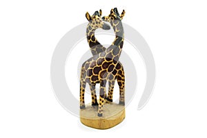 Wooden soul mate giraffe statue isolated on white background