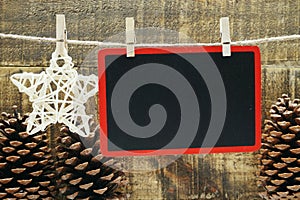 Wooden space copy hang with wooden clip and rope on wooden boards background