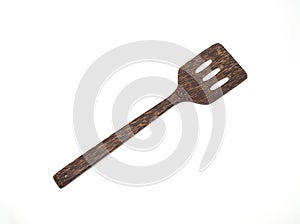 Wooden spade or flipper for frying pan isolated on white background