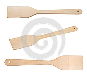 Wooden spatula spade frying pan isolated on white background