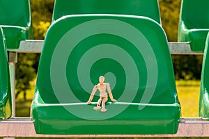 Wooden spectator sitting in stadium