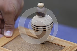 Wooden spinning top