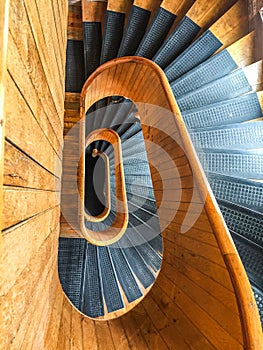 Wooden spiral staircase in Mill number five in Lowell, Massachusetts