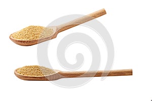 Wooden spoon with amaranth isolated on white background