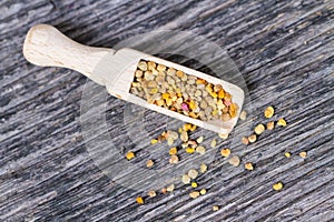 Wooden spoon with bee pollen