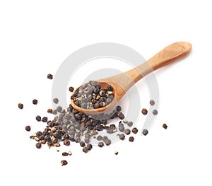 Wooden spoon and black peppercorn