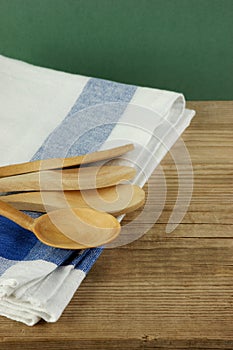 wooden spoon and dishcloth