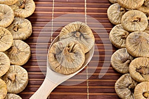 Wooden spoon with dried figs