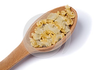 Wooden spoon with dry pastas