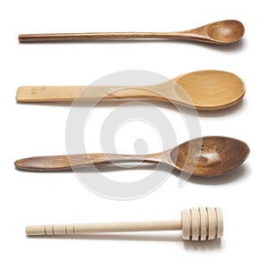 Wooden spoon isolated set with shadows closeup